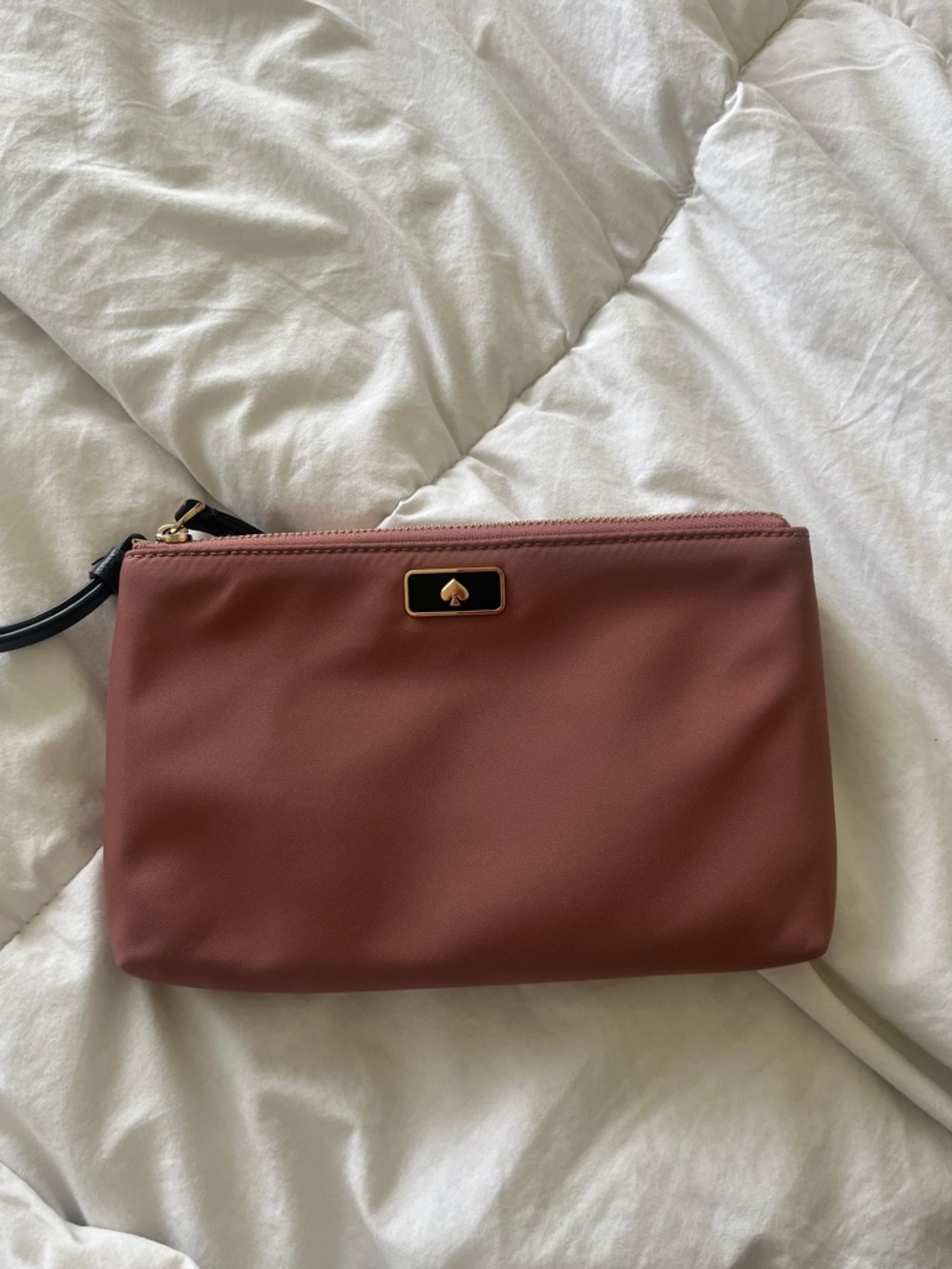 Kate spade rosewood pink wristlet with gold logo